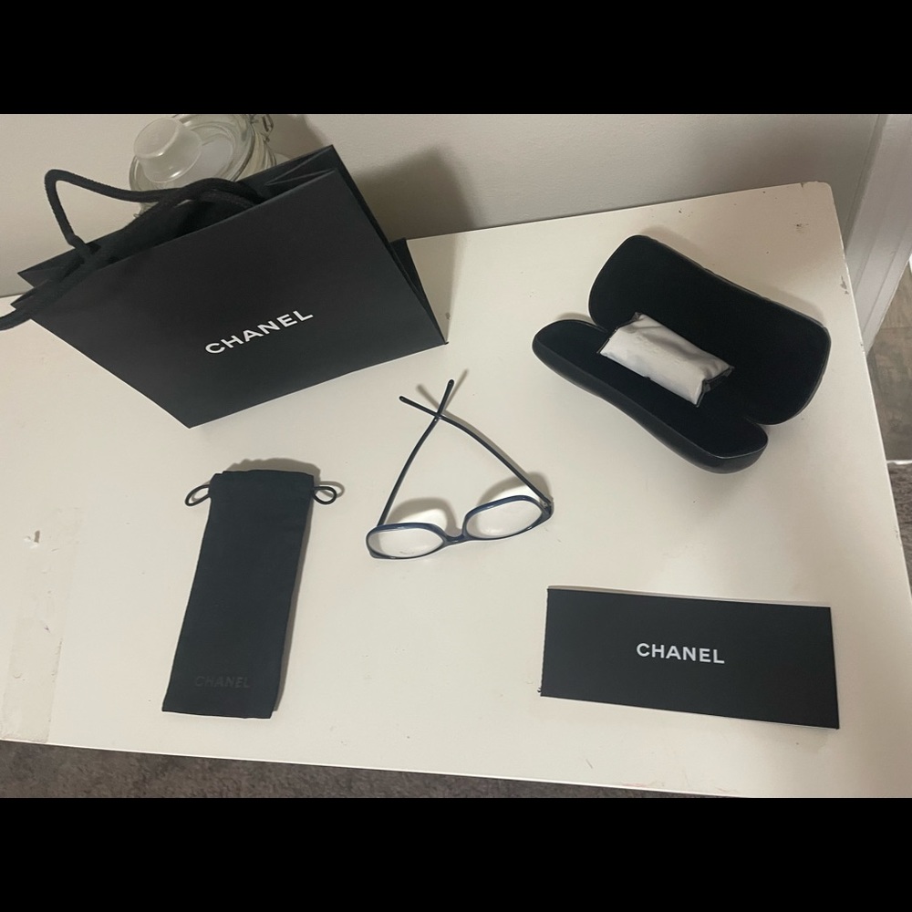 Like new Chanel eyeglasses. Worn once. All items in photo are included.  Blue